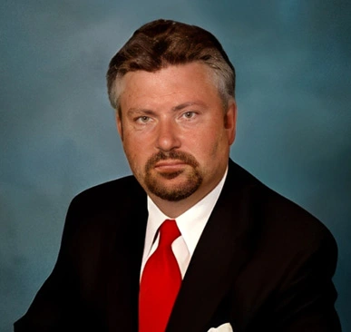 Professional headshot of Terry Armentrout, Esq. with a 4.8-star review rating.