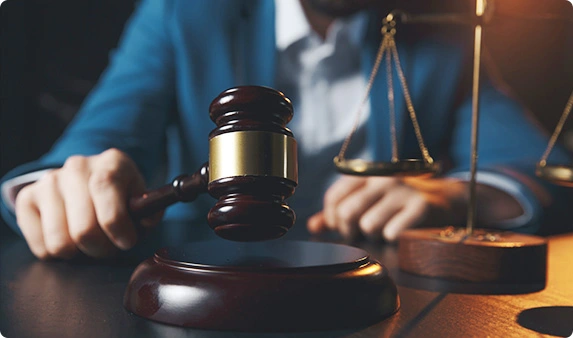 Judge's gavel and scales of justice: personal injury and employment law representation in Virginia.